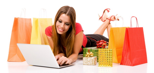 Beautiful young woman shopping over internet